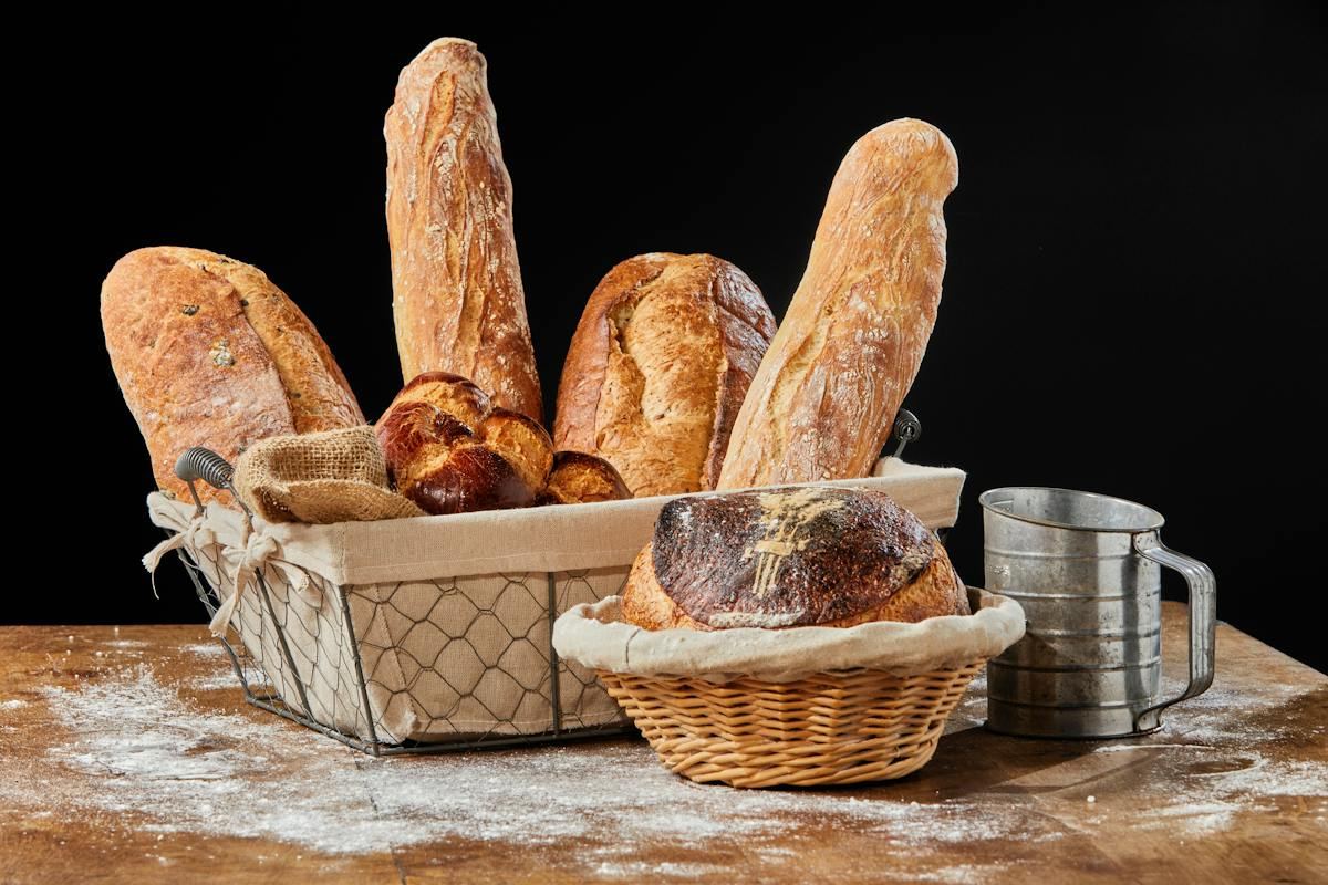 Fresh baguettes and boules in a Pandor proofing basket