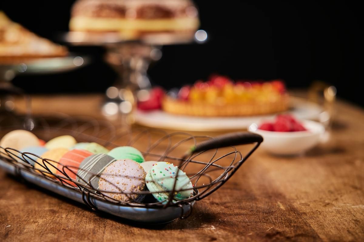 Macarons and fruit tarts in the Pandor pastry case